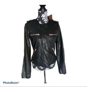 Biker jacket. Faux leather with silver studs